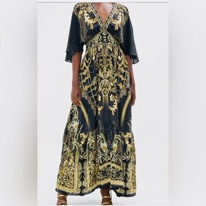 Camilla silk with hand stoned crystals. Dress worn once! Incredibly beautiful!